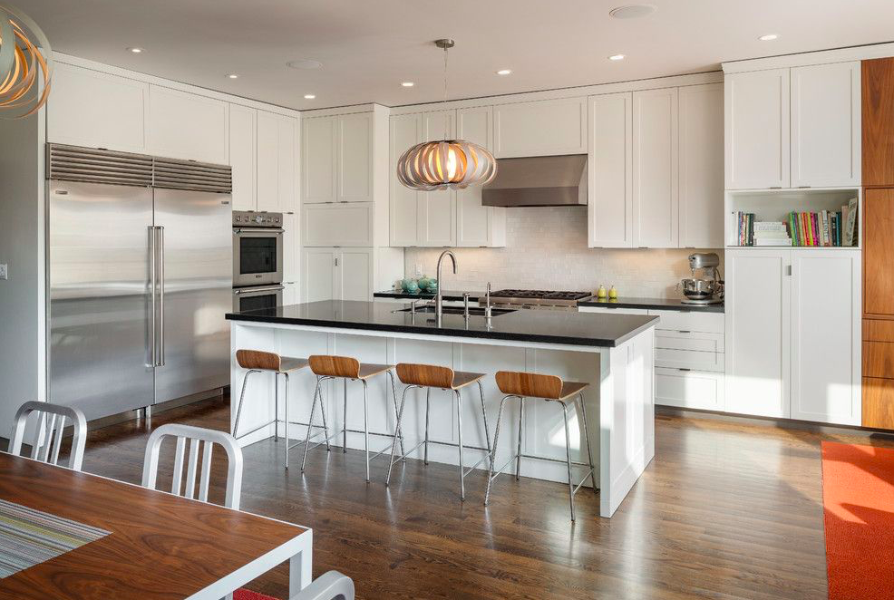 Modern kitchen with wishbone chairs