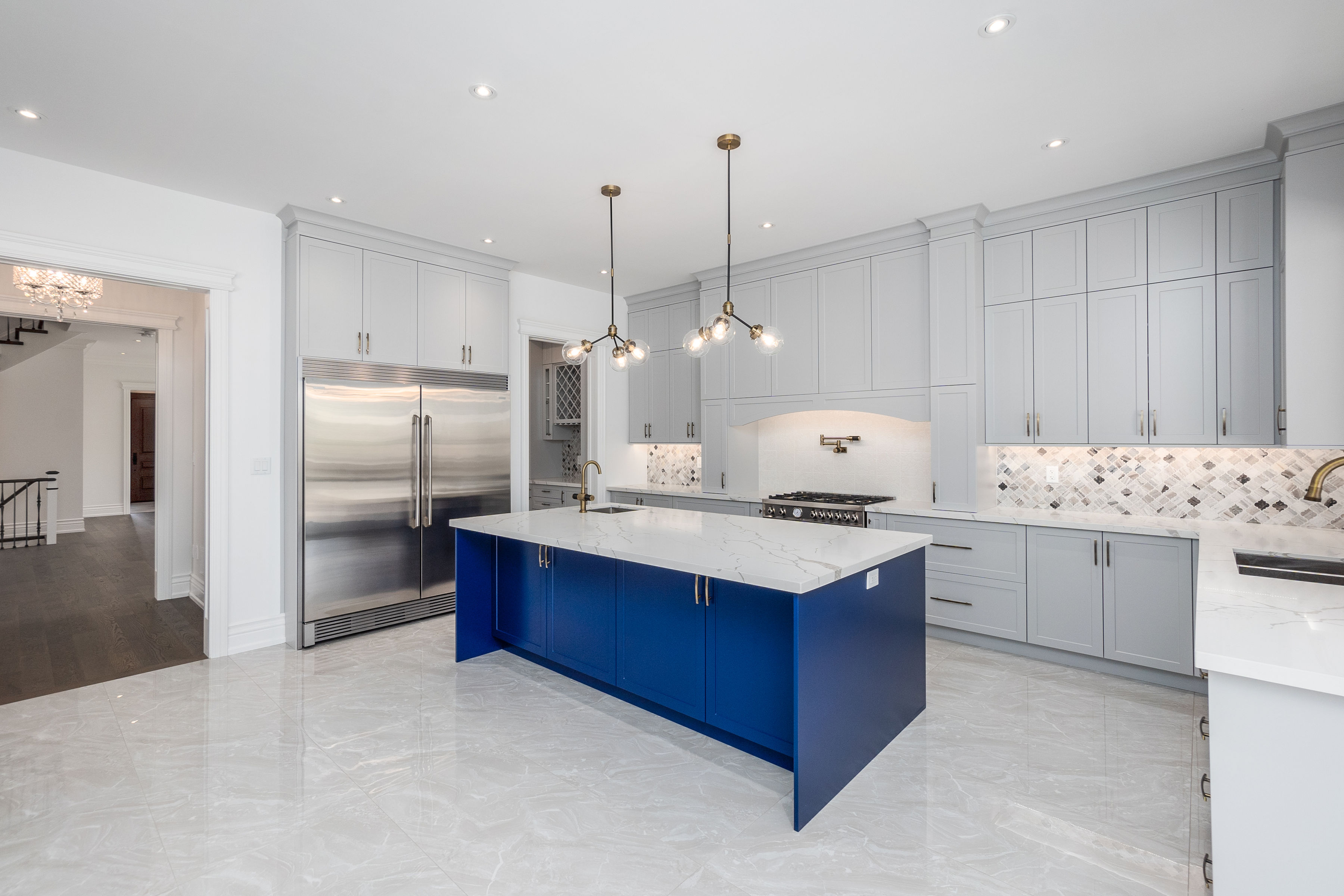 Bright kitchen with blue island
